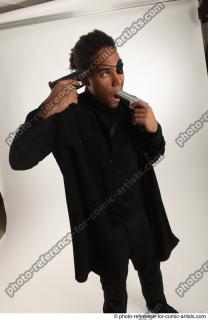 09 2018 01 GARSON STANDING POSE WITH GUNS SUICIDE